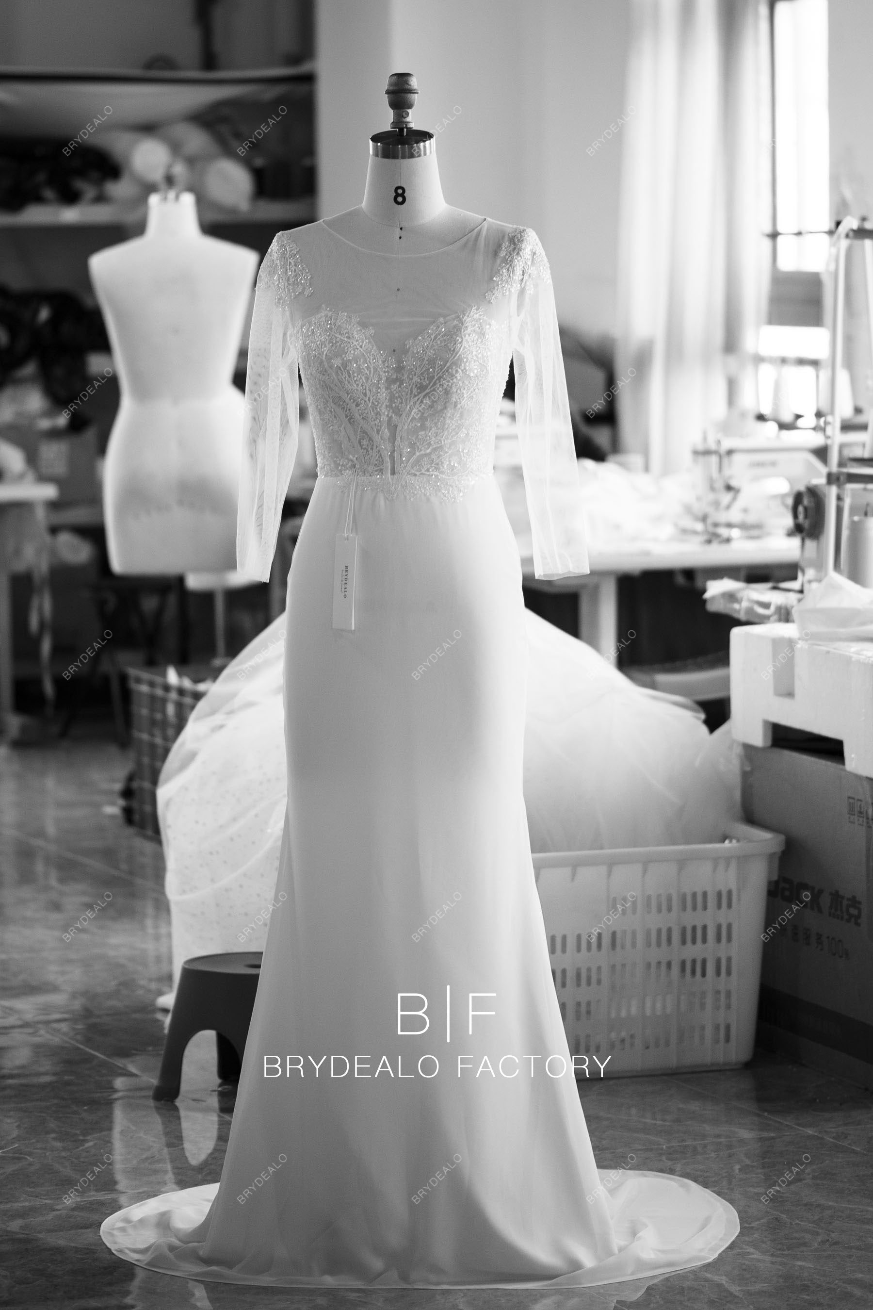 shimmery lace sleeved crepe fit flare wedding dress