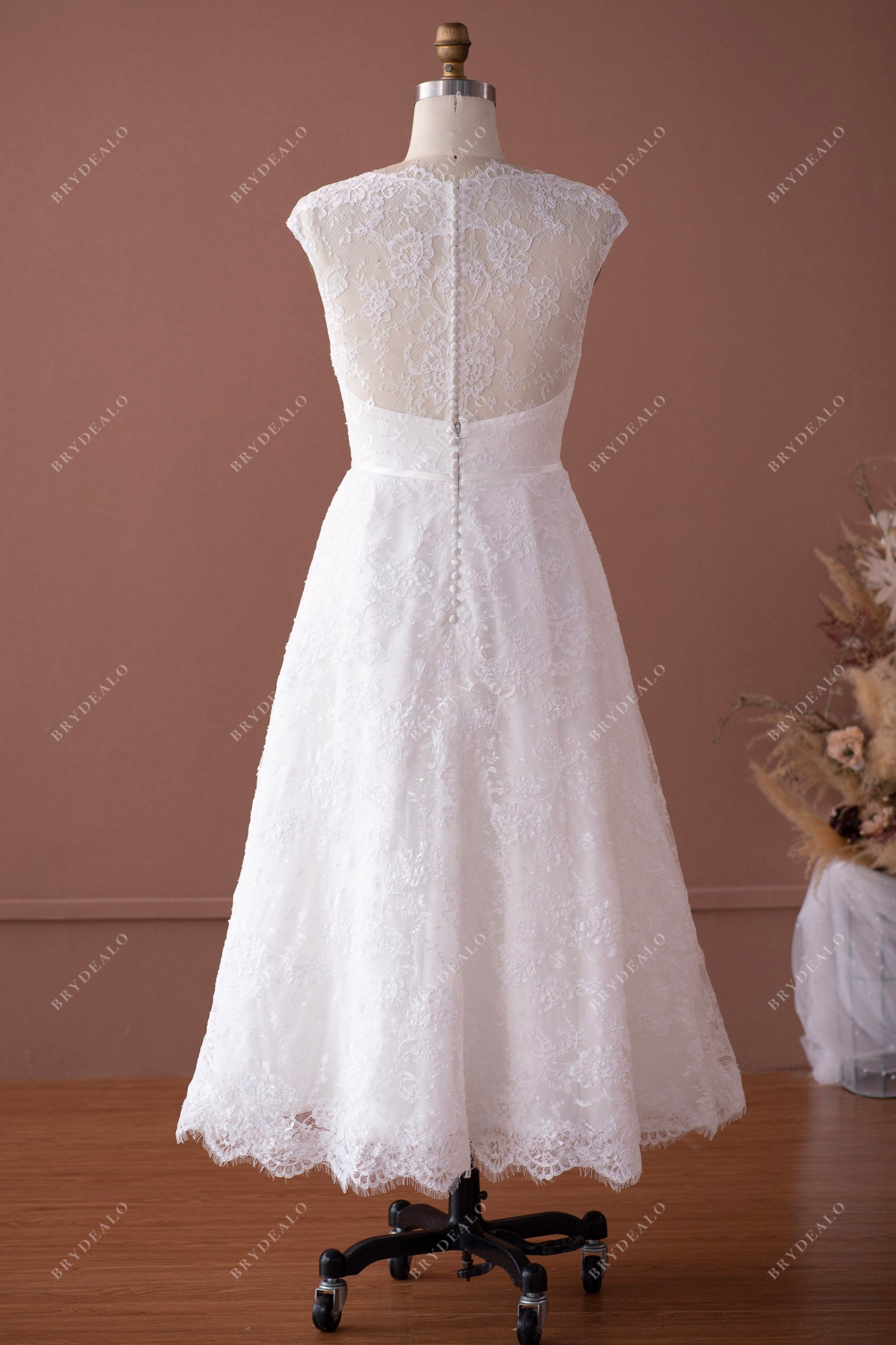 illusion back knee length bridal gown