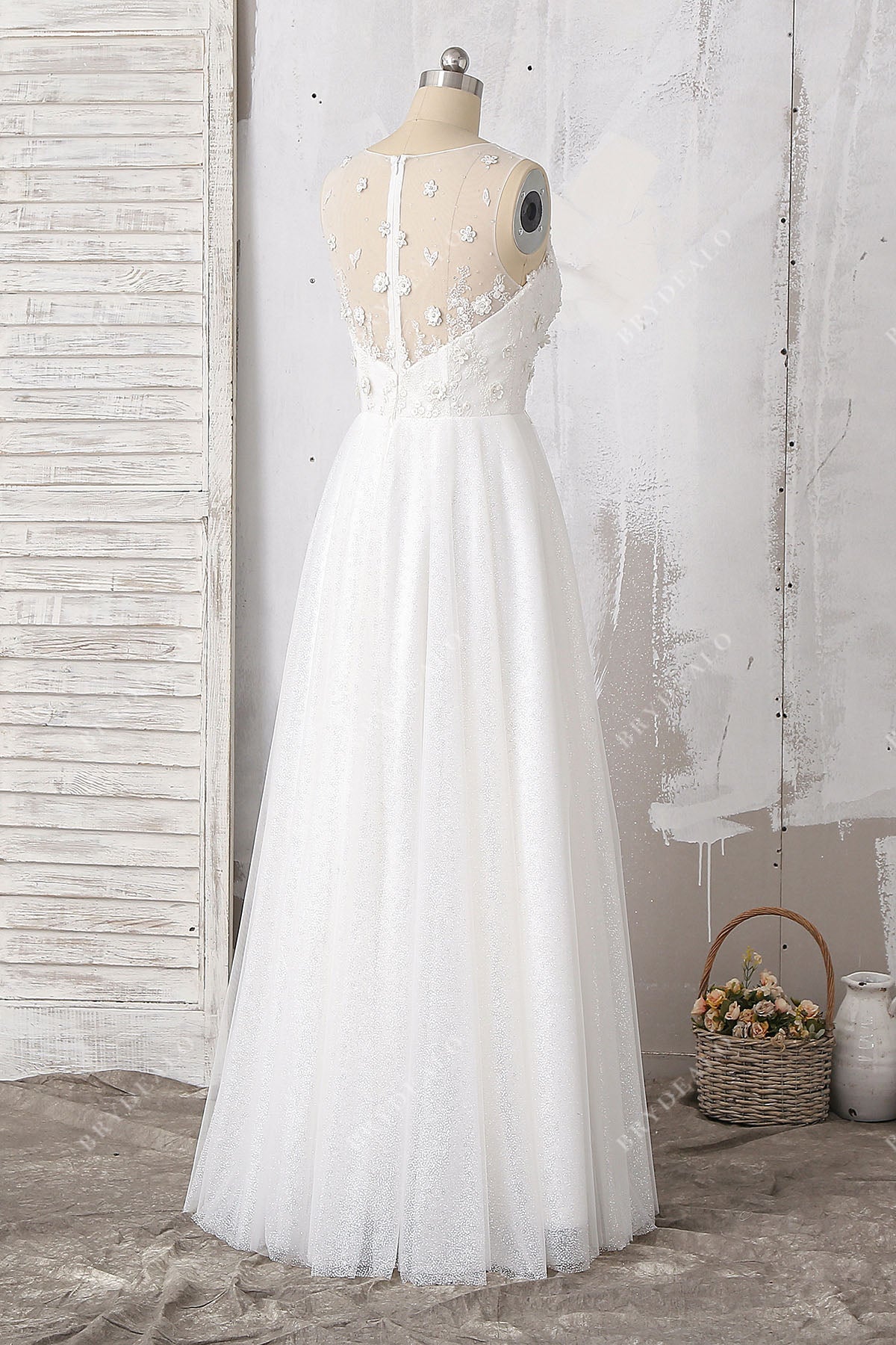 sleeveless illusion back floor length bridal gown