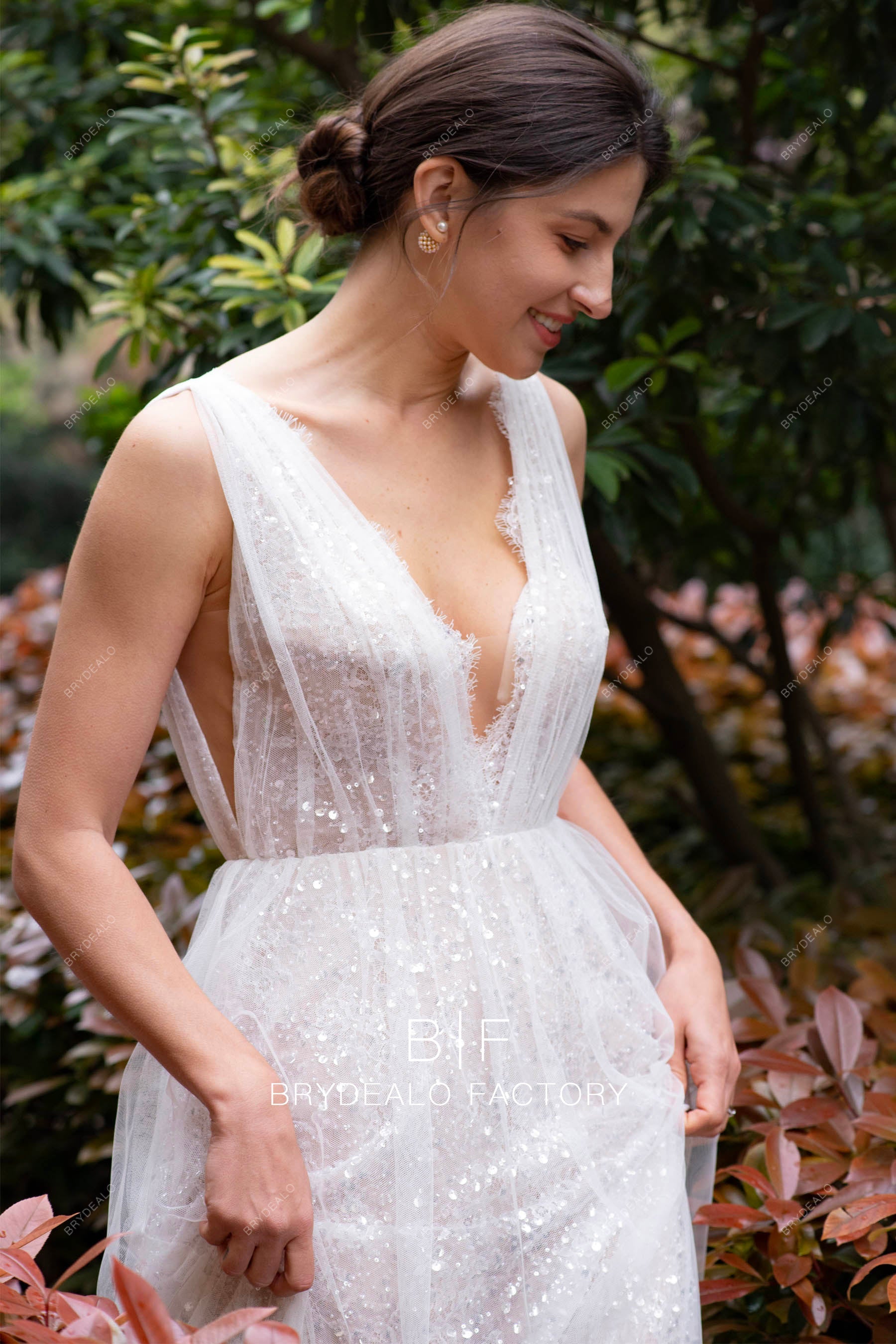 sparkly pleated plunging wedding dress