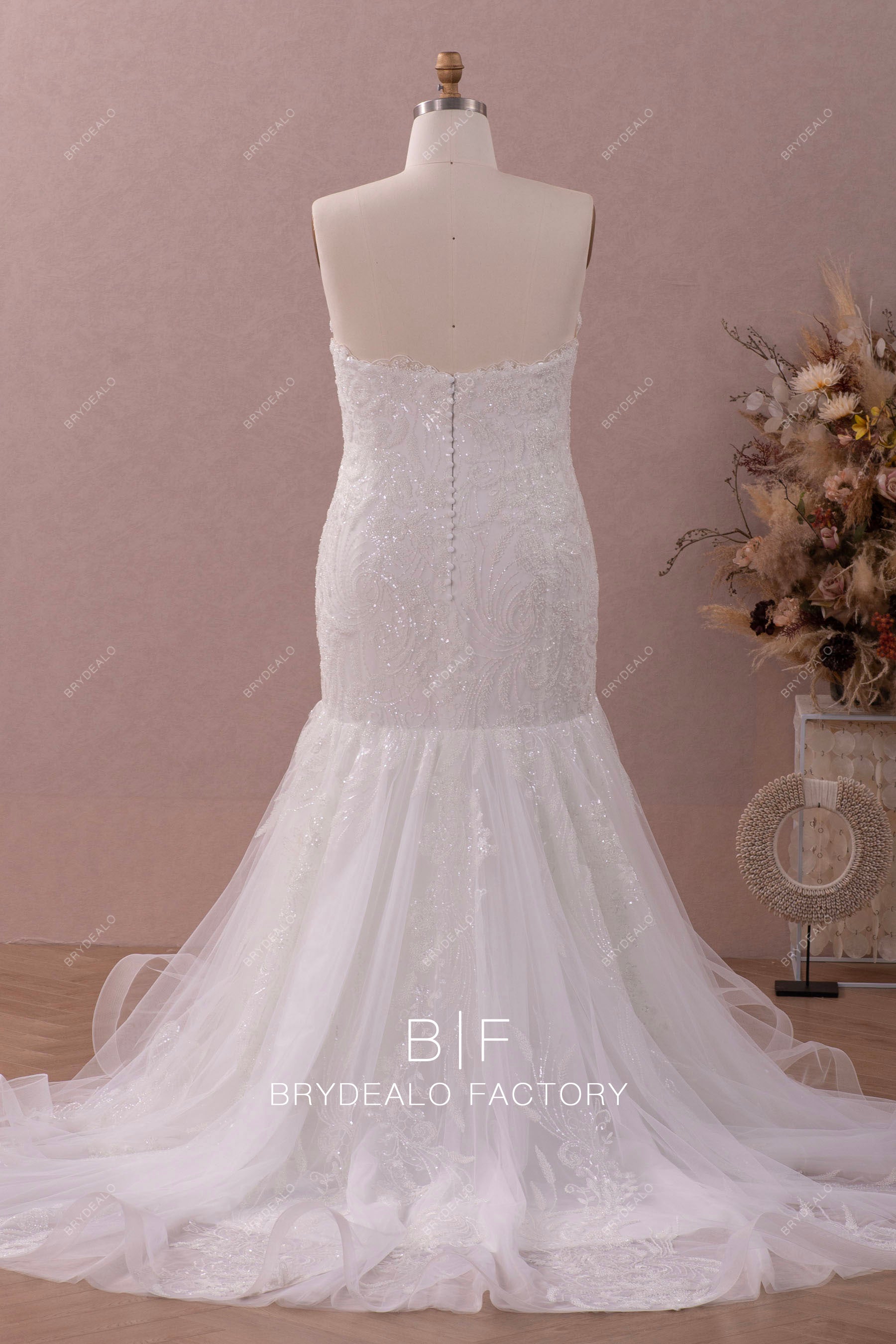 strapless ruffled train mermaid wedding dress