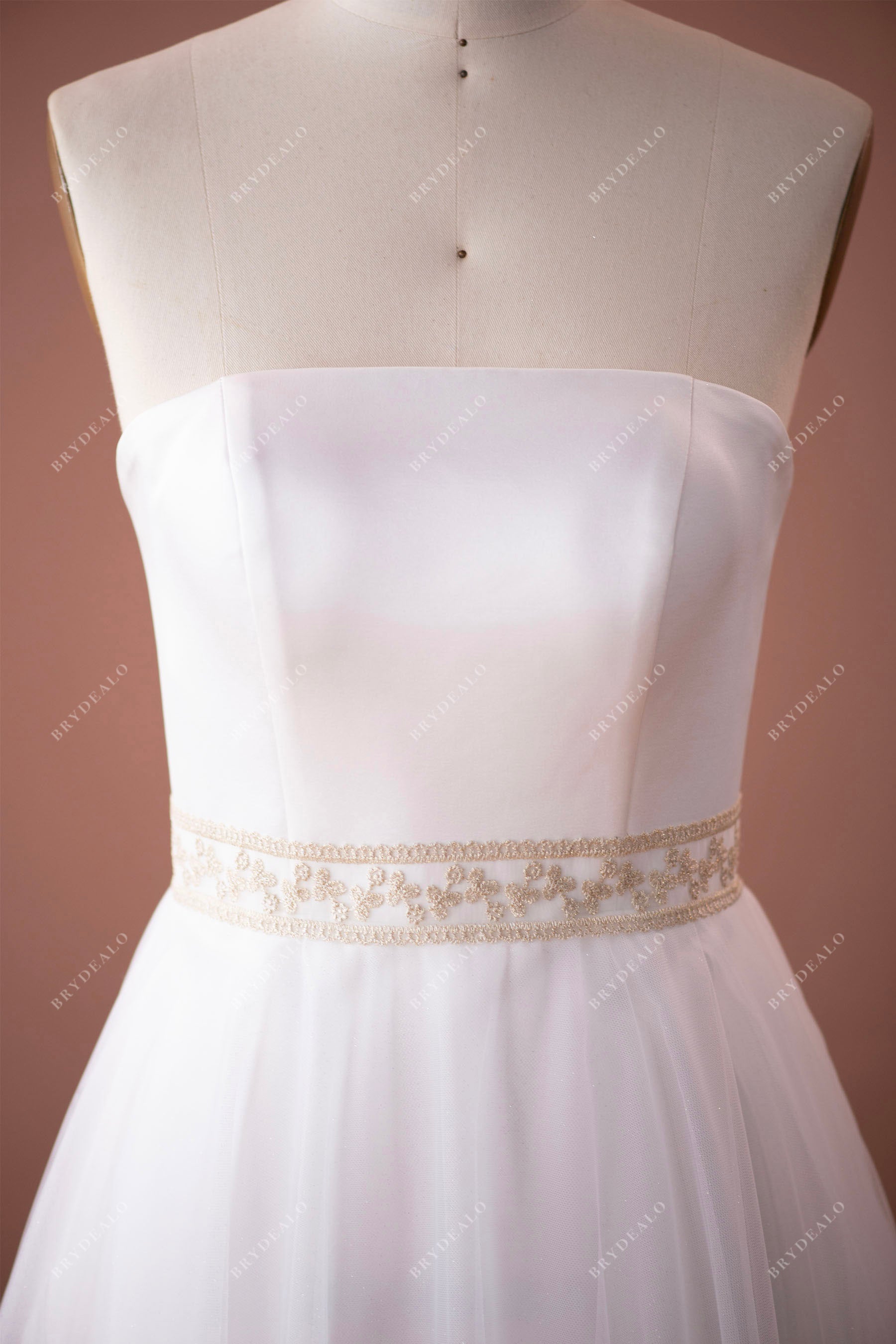 strapless straight across neck A-line wedding dress with champagne belt
