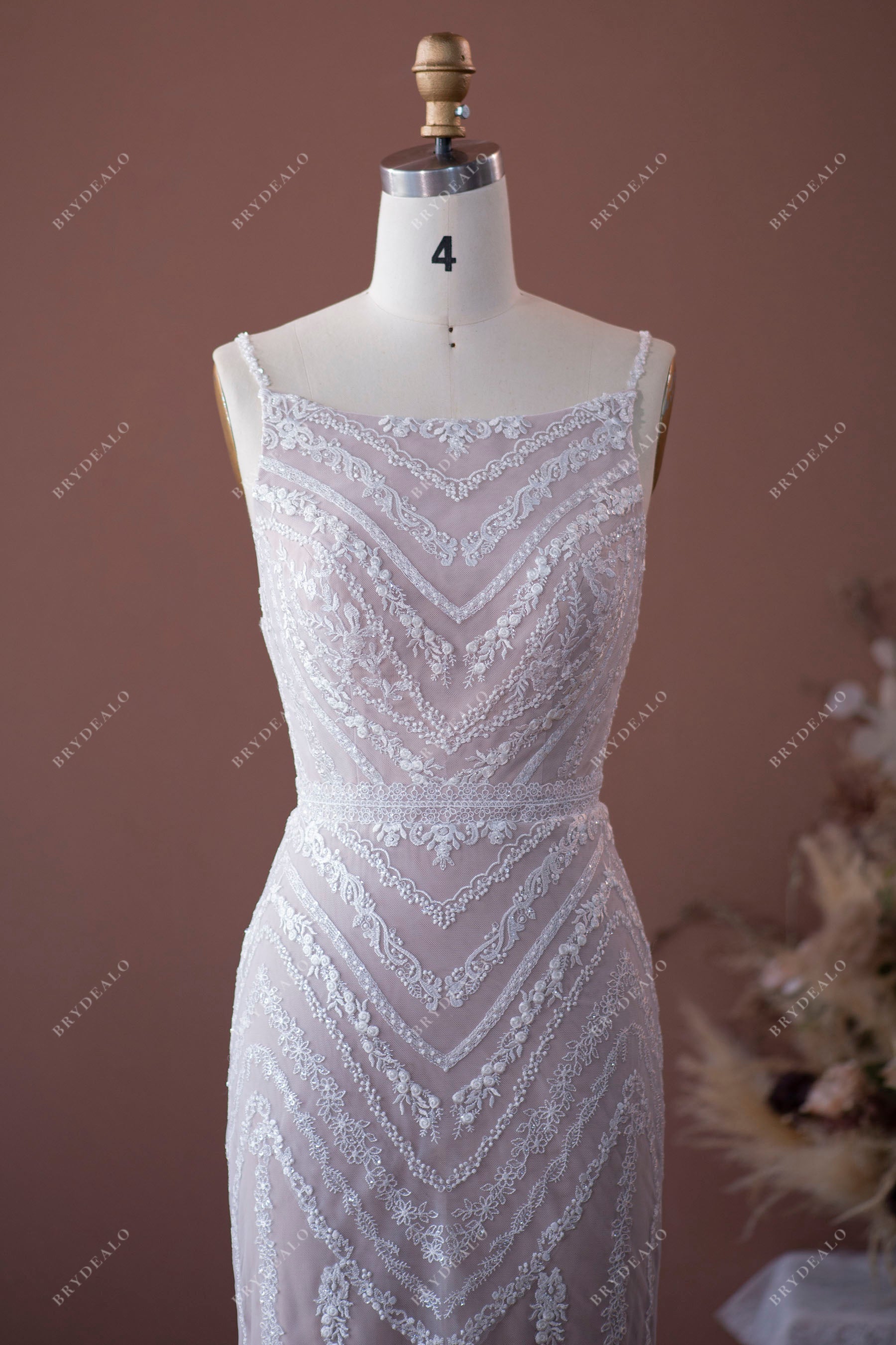 symmetrical leaf patterned lace bridal dress