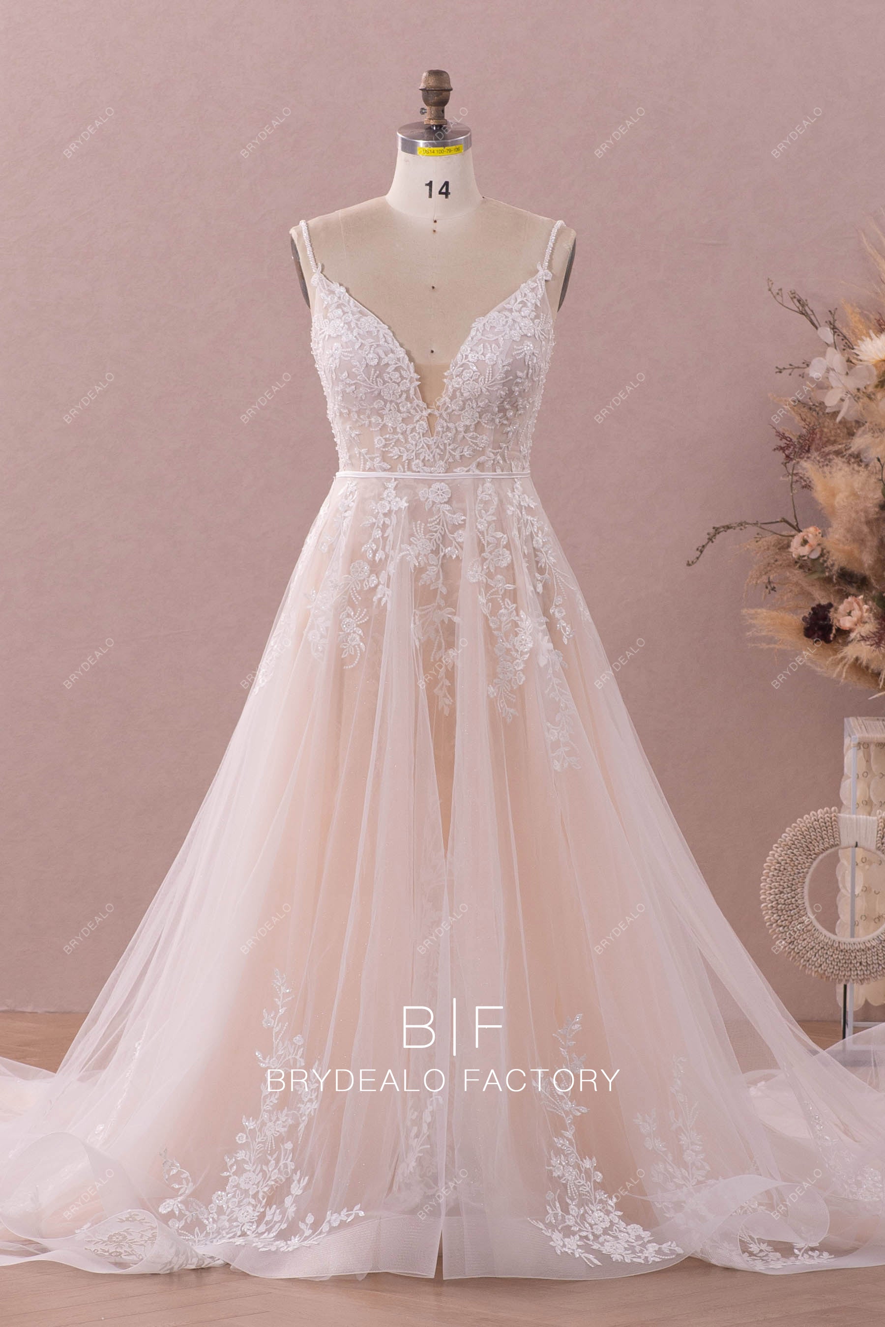 thin straps plunging beaded lace ruffled wedding dress